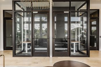 Over sized glass-railed doors